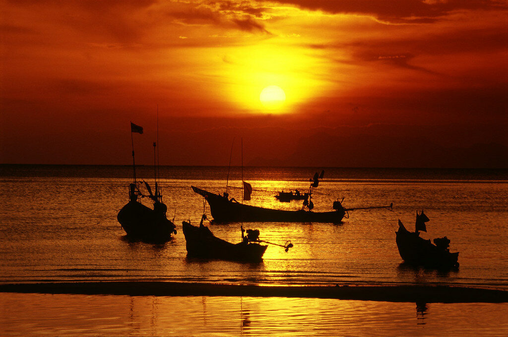 Watching the sunset on the beach is one of the most unforgettable experiences when traveling to Thailand's islands.