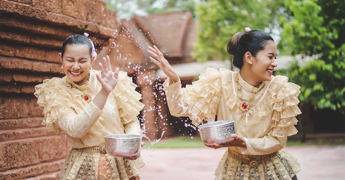 Songkran, the Thai New Year, is a beautiful time to travel to Thailand and experience its vibrant culture.